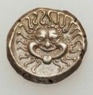 símbolo gorgona en moneda romana